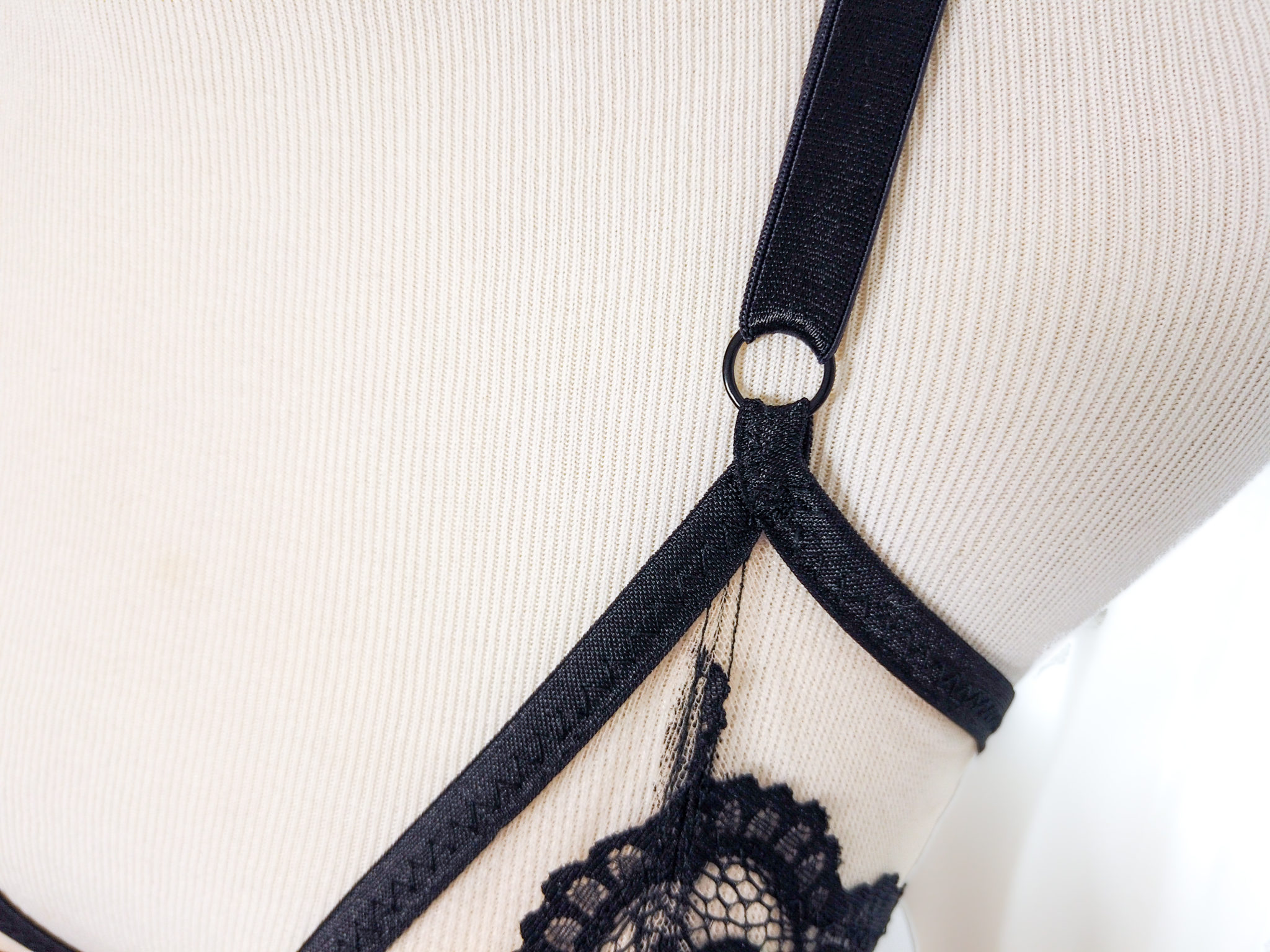 Close up shot of the bra strap on Paula's Jordy bralette. 